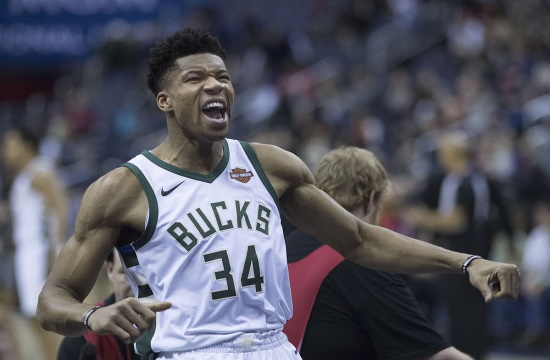 "Greek Freak" hands out food to the needy in his old Athens neighbourhood