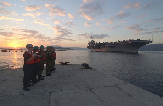 USS aircraft carrier docks at Souda Bay in Crete and crew gets shore leave