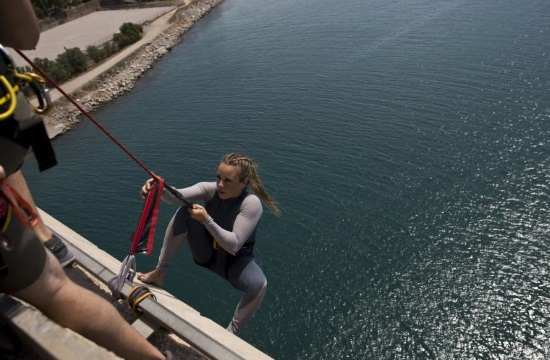 Greek aerial dancer performs dance on 111-foot high bridge
