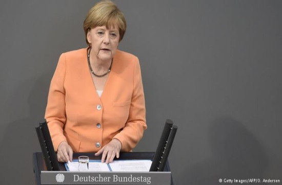 Chancellor Merkel “sits” on a toilet in first German Charlie Hebdo edition