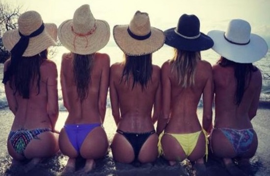 Victoria's Secret Alessandra Ambrosio poses with friends in Brazilian beach