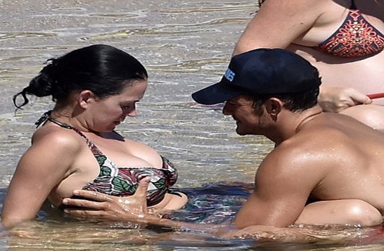 Orlando Bloom and Kate Perry cuddle publicly on Sardinia beach