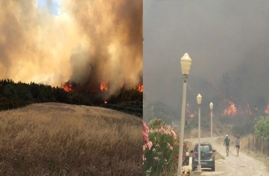 Wildfire threatens homes in southern Rhodes (video)