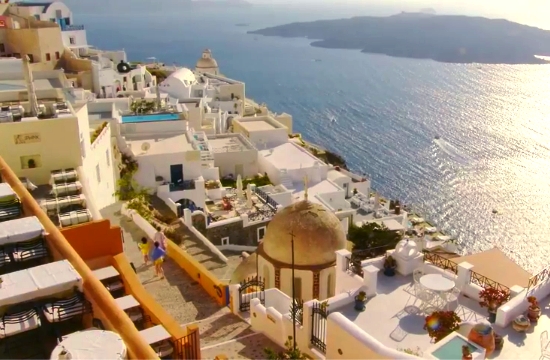 Model Emily Ratajkowski vacations in Santorini and poses against the Caldera