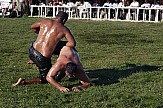 AP: Oil wrestling practiced with devotion in Northern Greece