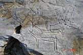 Ancient carvings scraped off rocks on Pangaion Hills by vandal gold-diggers