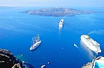 The “Greek Isles Itinerary” includes stops in Santorini, Rhodes, Crete, and Mykonos islands with an overnight stay in Mykonos