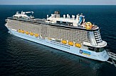 World’s largest cruise ship docks at Greek port of Piraeus