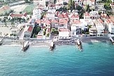 Report: The Greek town where each house boasts a private beach (video)