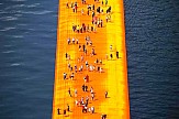 Thousands of tourists "walk on the water" of Lake Iseo in Italy (pics and vids)