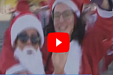 Hundreds dressed as Santa run down Athens streets for charity (video)